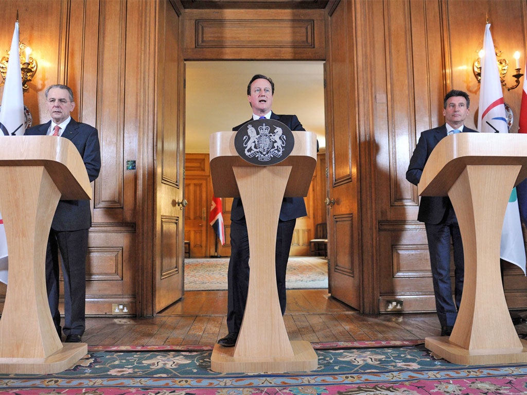 Jacques Rogge, left, with David Cameron and Lord Coe at No 10 yesterday