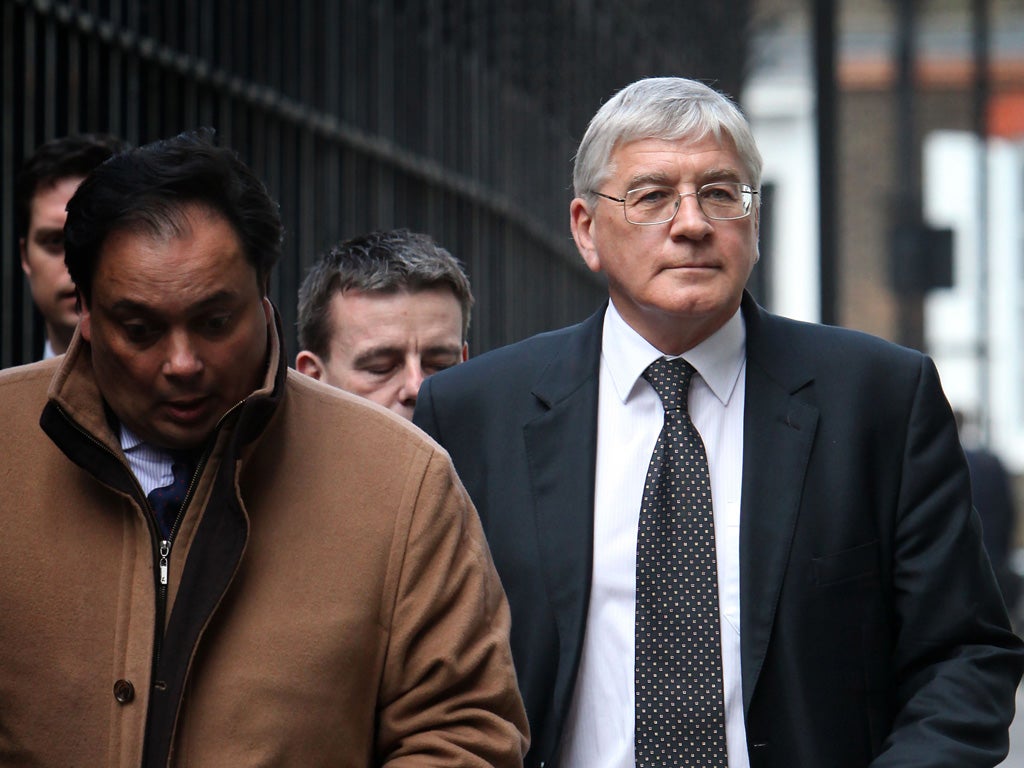 Dick Fedorcio, right, arrives at the Leveson Inquiry into press ethics earlier this month