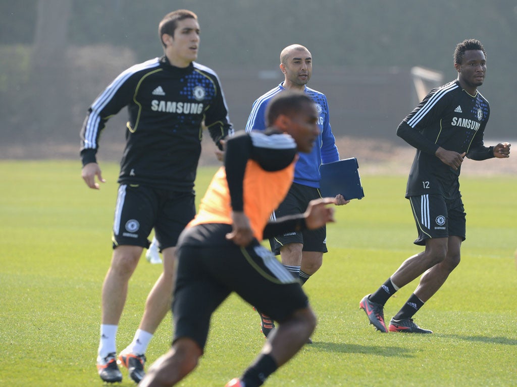 Roberto Di Matteo watches training at Cobham