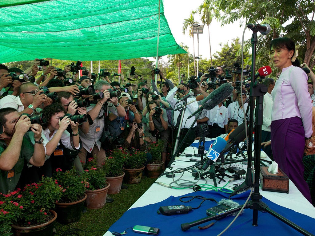 AungSan Suu Kyi tells the press that 'illegal' campaign tactics are
'beyond what is acceptable'