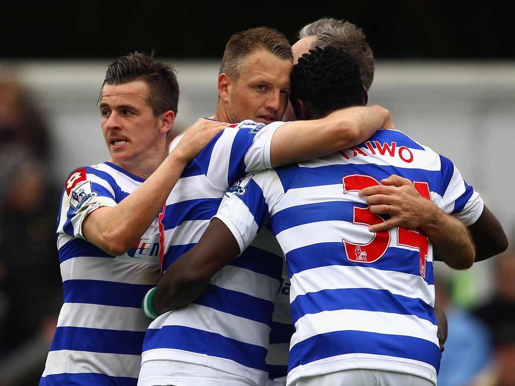 QPR's Joey Barton, Clint Hall and Taye Taiwo celebrate victory