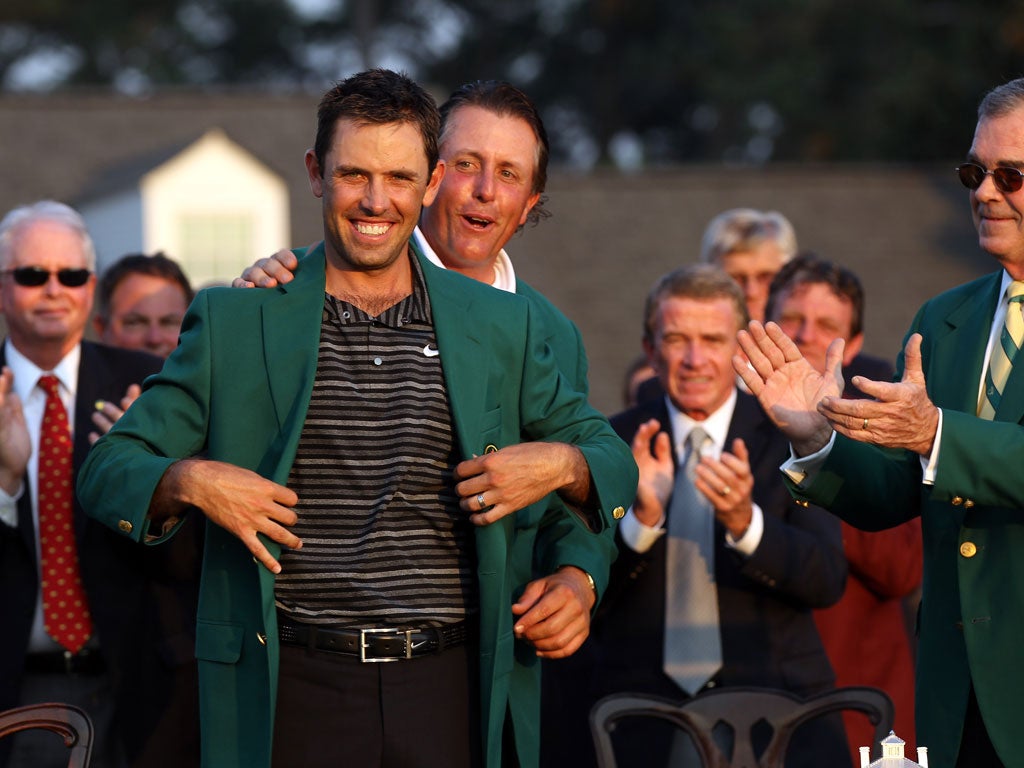 If the coat fits: Charl Schwartzel wins the 2011 Masters