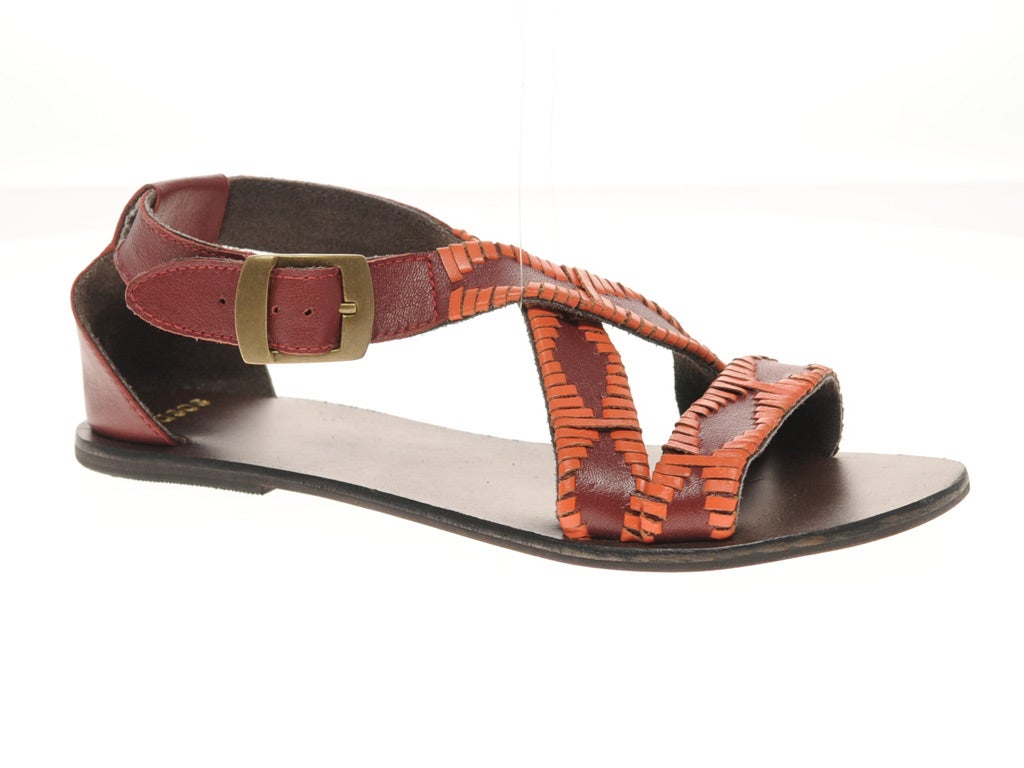1. ASOS: £32, asos.com - Get the global-traveller look that is sweeping the catwalks just now, with these flat, red leather sandals embellished with a chunky orange top-stitch detail.