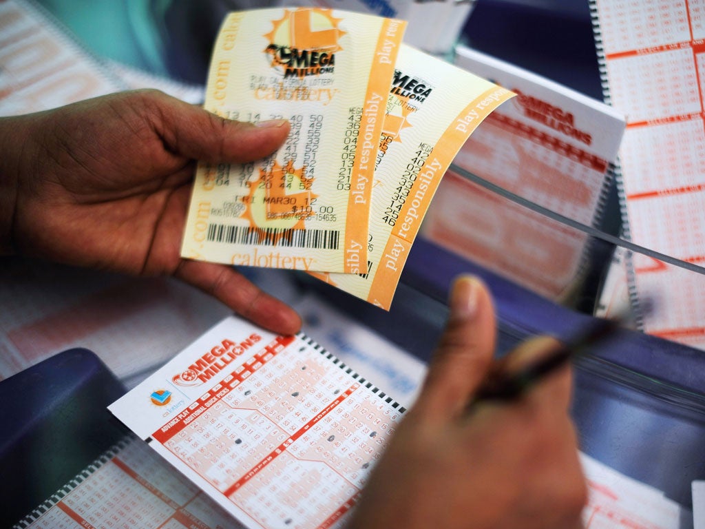 Three winning tickets will share the $656 million prize