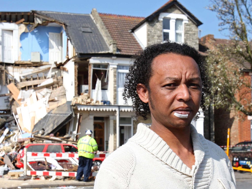 Clarel Sainte Marie, above, walked away unharmed from his flat after a suspected gas explosion