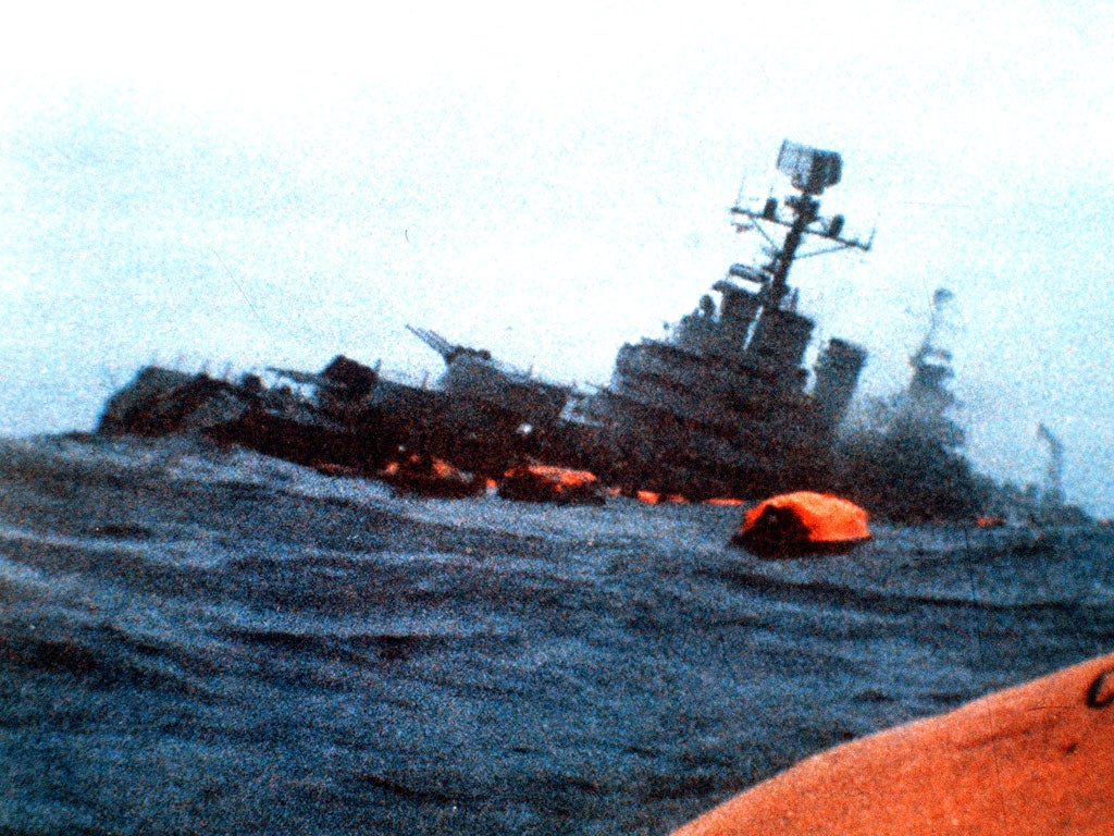 The Belgrano sinks amid orange life rafts holding
survivors in the South Atlantic in May 1982