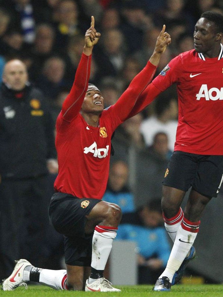 Antonio Valencia celebrates his goal against Blackburn Rovers with teammate Danny Welbeck at Ewood Park