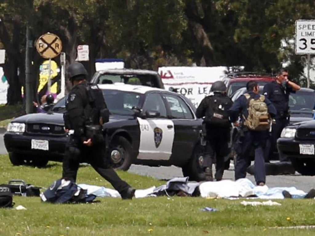 Bodies lie outside the Christian college in Oakland,