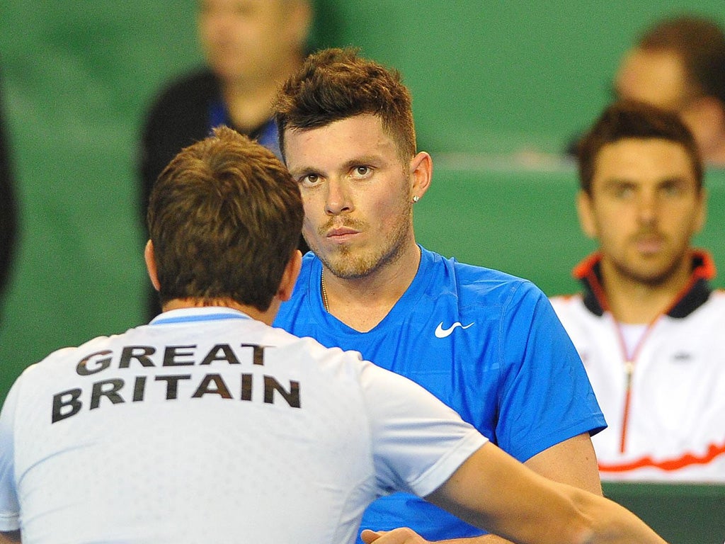 Josh Goodall gets on-court advice from GB team captain Leon Smith