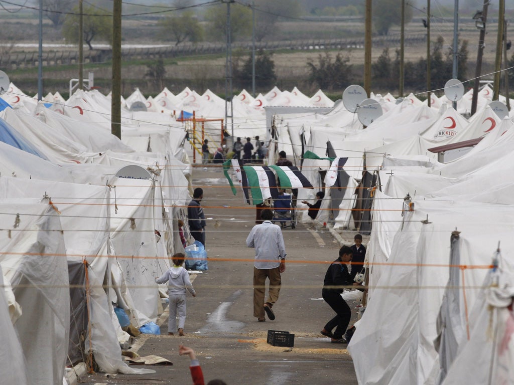 Syrian refugees at a camp on the Turkish-Syrian border