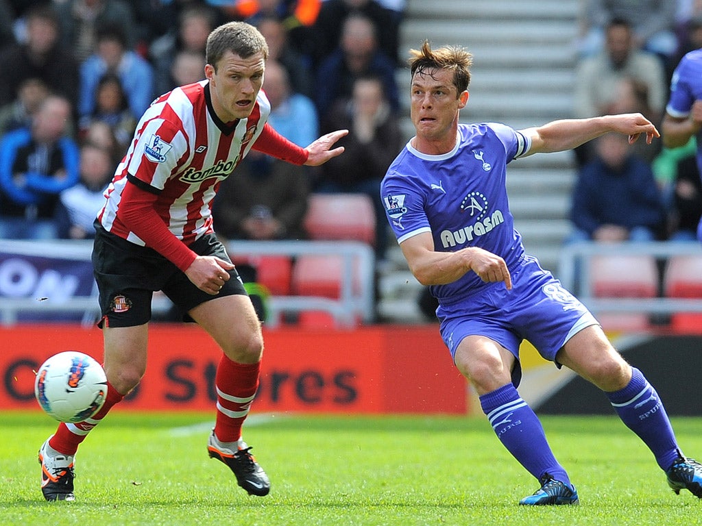 Tottenham's Scott Parker, right, vies with Sunderland midfielder Craig Gardner