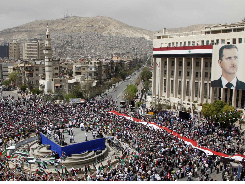 A rally in Damascus yesterday to celebrate the 65th anniversary of the ruling Ba'ath Party