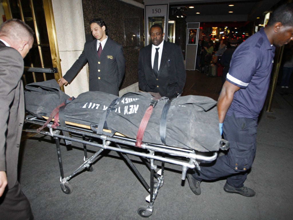 Richard Descoings' body is removed from the Michelangelo hotel, New York