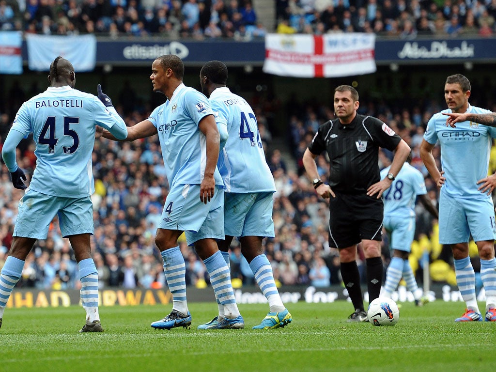 Not so super Mario: Balotelli (far left) loses the plot against Sunderland. I bet my bottom dollar that he doesn't want Carlos Tevez to be at the club