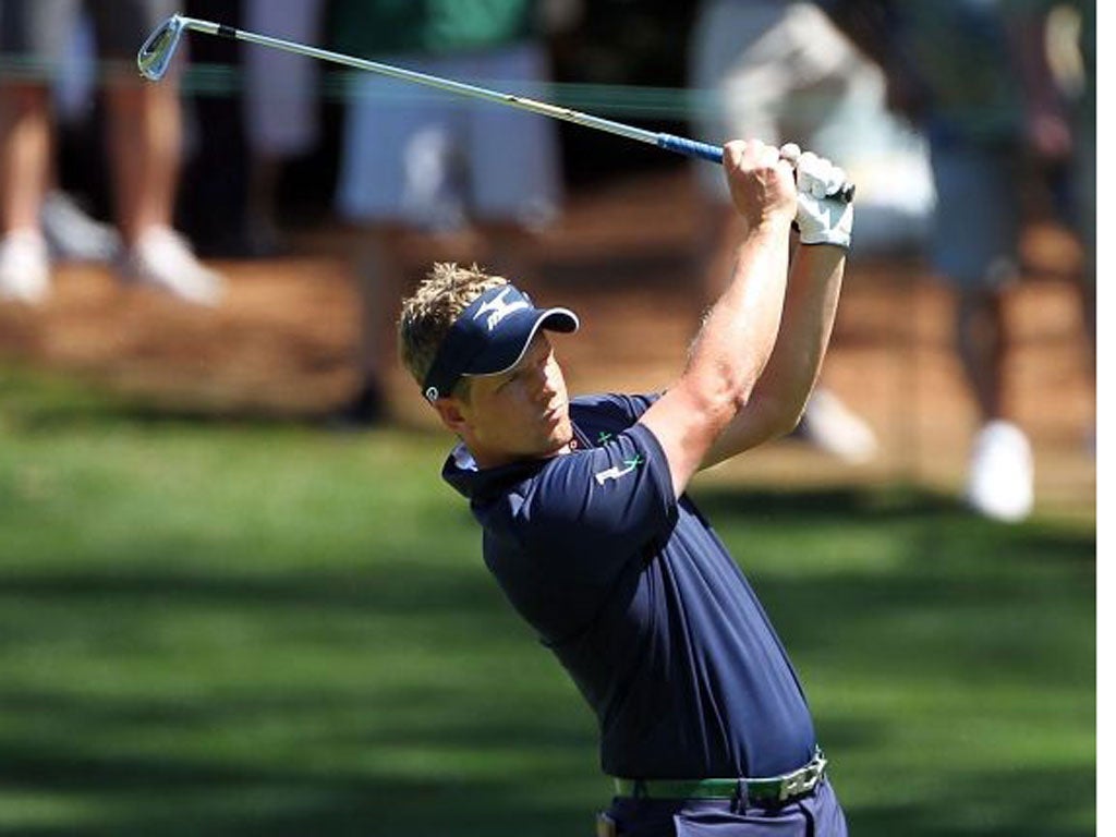 Luke Donald plays his second shot to the 10th last night