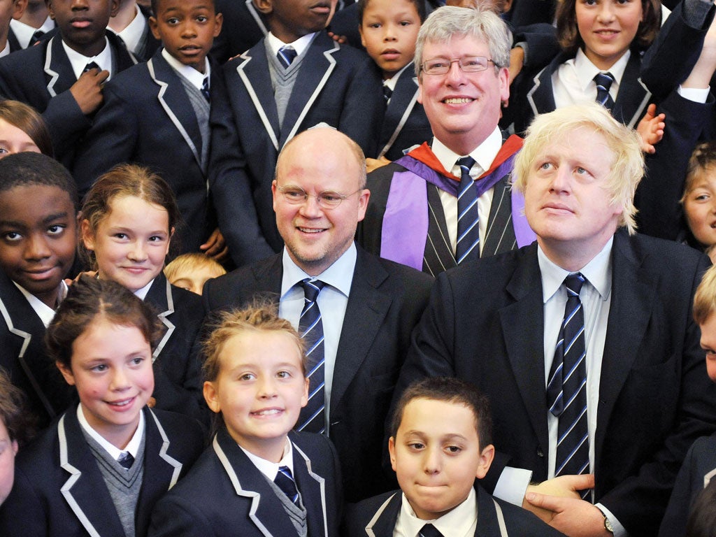 Boris Johnson is welcomed to West London Free School in Hammersmith by the author Toby Young, who was one of the school’s founders last year, and headteacher Thomas Packer