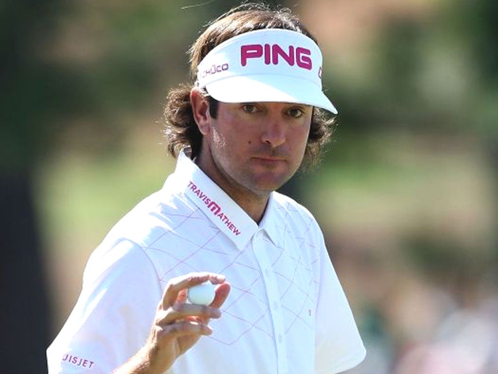 American Bubba Watson gestures after a putt on the 13th hole during the final round of the 2012 Masters Tournament at Augusta National Golf Club