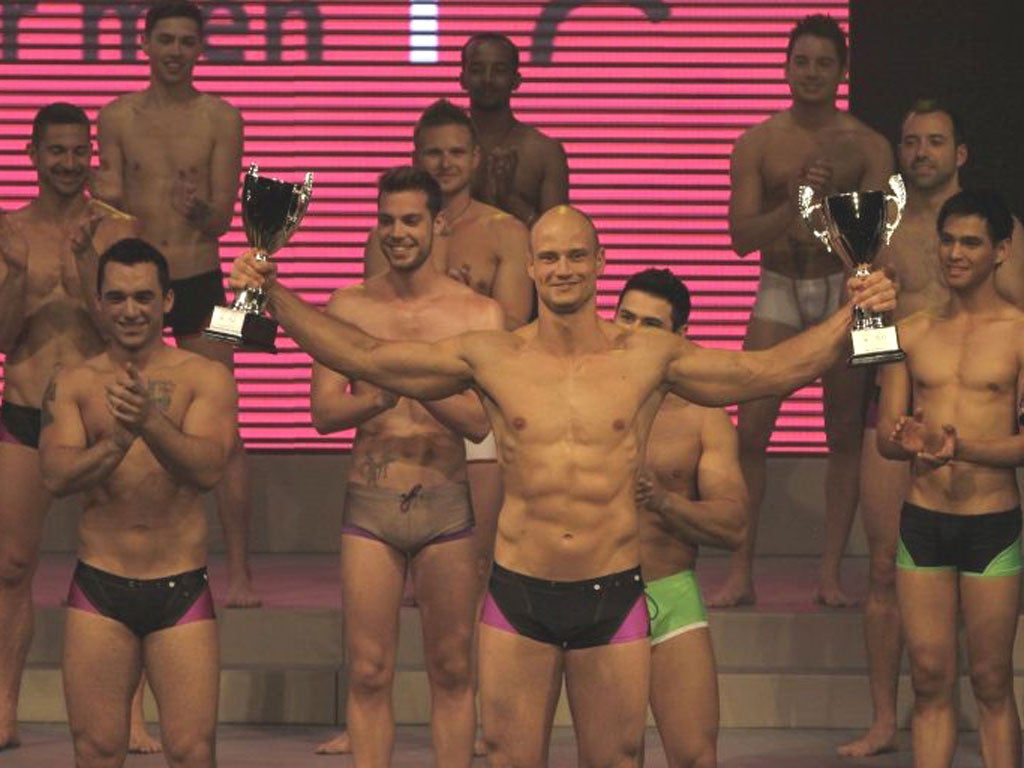 Andreas Derleth of New Zealand with his trophies during the grand finale of the Mr. Gay World 2012 competition, in Johannesburg yesterday