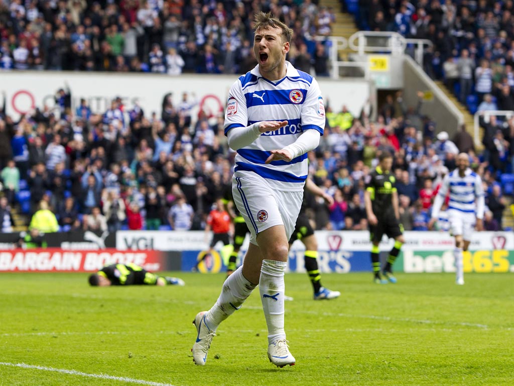 Adam Le Fondre of Reading celebrates against Leeds