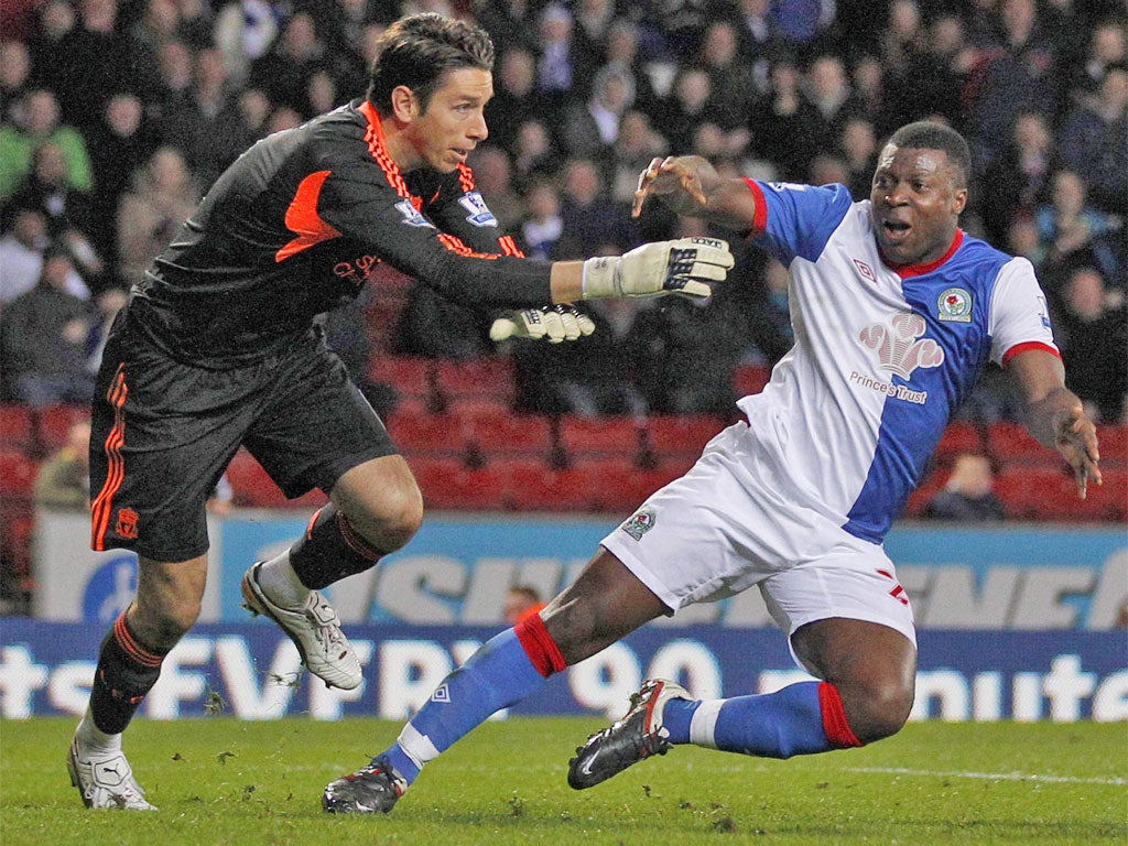 Brad Jones gave away a penalty for this push on Blackburn's Yakubu