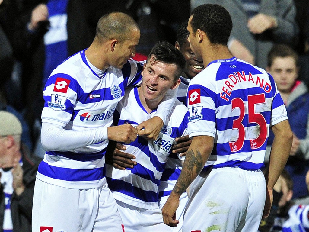 Joey Barton (centre) is congratulated on his goal