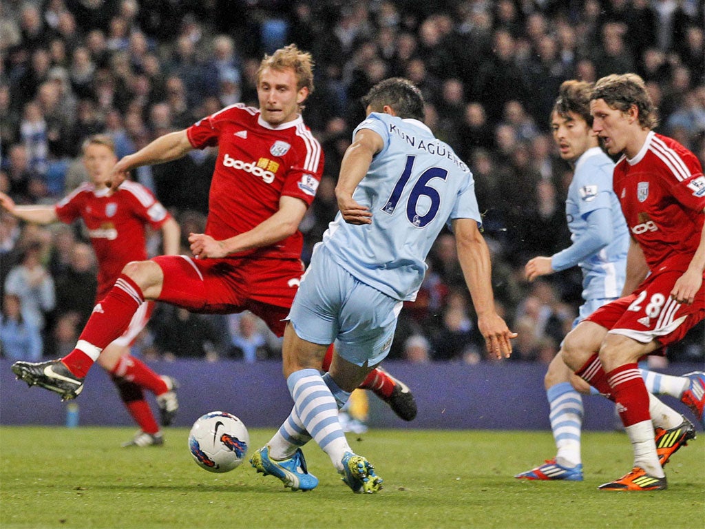 City's Sergio Aguero scores his second last night