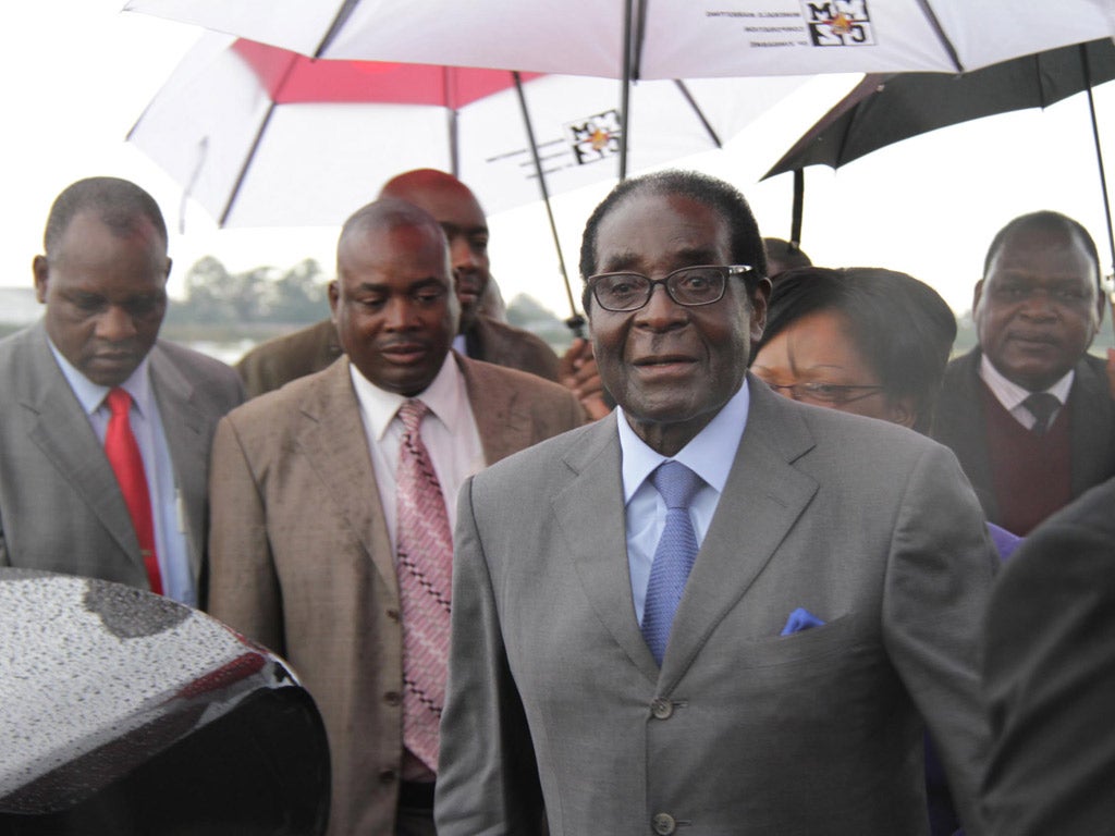 Robert Mugabe flew back from Asia to Harare yesterday, seemingly in good health