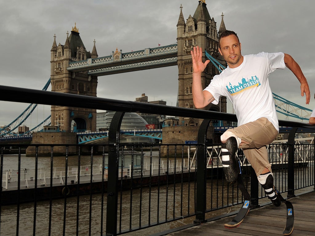 Oscar Pistorius brings his sprinting style to London – on the Thames Path near Tower Bridge