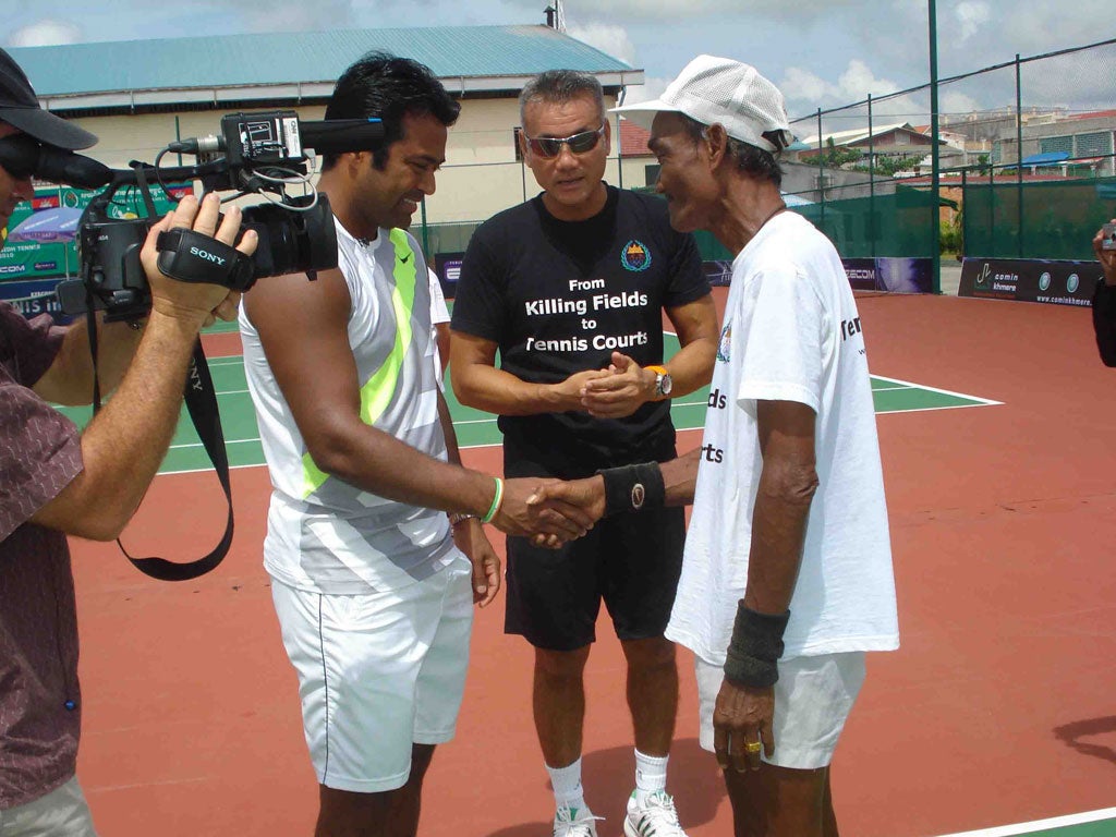 Tep Rithivit, centre, Leander Paes and Yi Sarun, on right, one of only three Cambodian tennis players to survive the killing fields