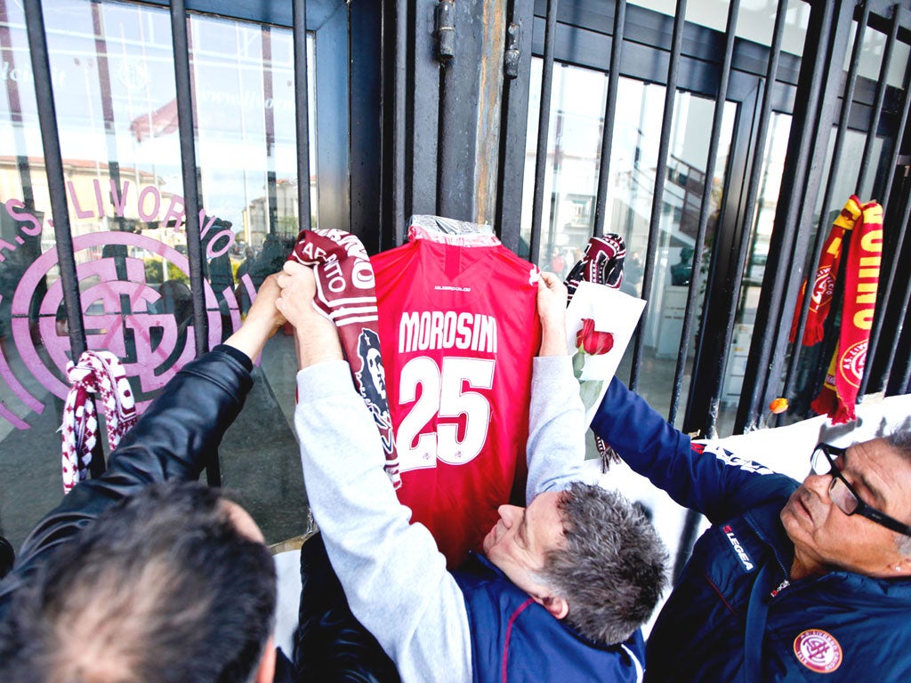 Fans pay tribute to Piermario Morosini in Italy yesterday