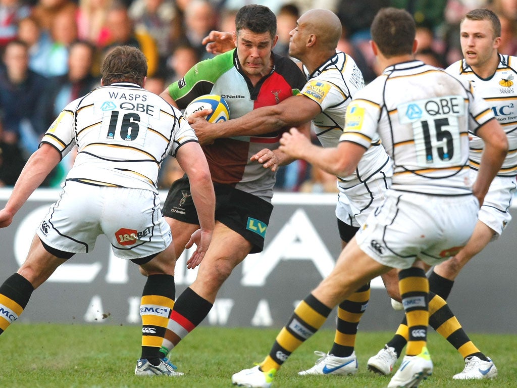 Wasps attempt to halt the progress of Harlequins’ Nick Easter