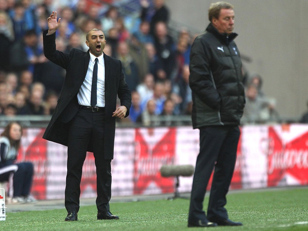 Harry Redknapp and his Chelsea counterpart Roberto Di Matteo watch proceedings from the touchline at Wembley yesterday