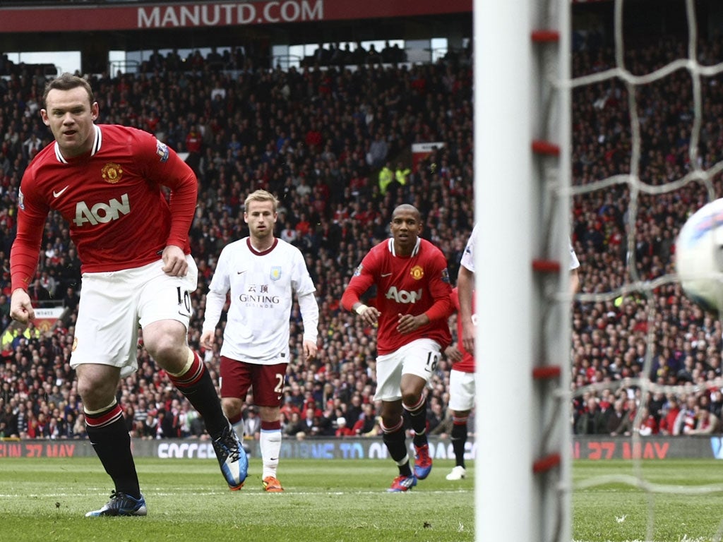 Wayne Rooney slots home the penalty