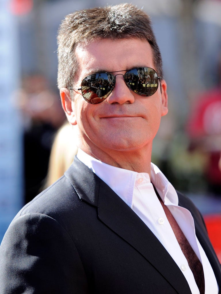 Simon Cowell is chewing the fat with TV bosses about a talent show about cooking