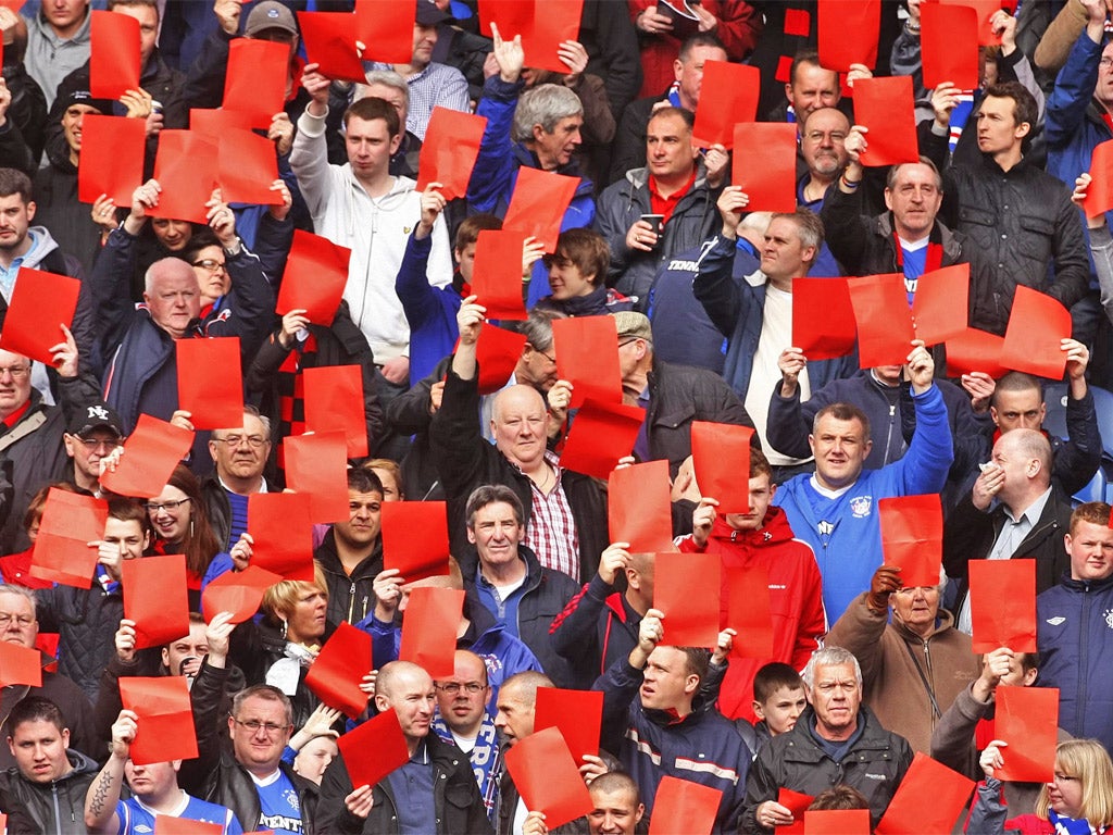 Rangers fans take part in a protest warning against the danger of the club going into liquidation