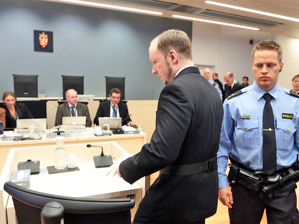 Anders Behring Breivik approaches the witness box in the courtroom in Oslo yesterday to explain his motives for the mass killing last July