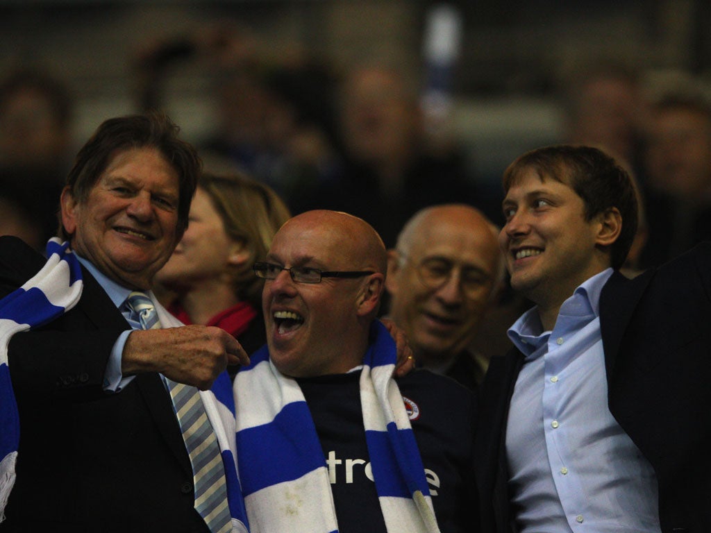 Chairman Sir John Madejski (left) and manager Brian McDermott (centre) celebrate promotion