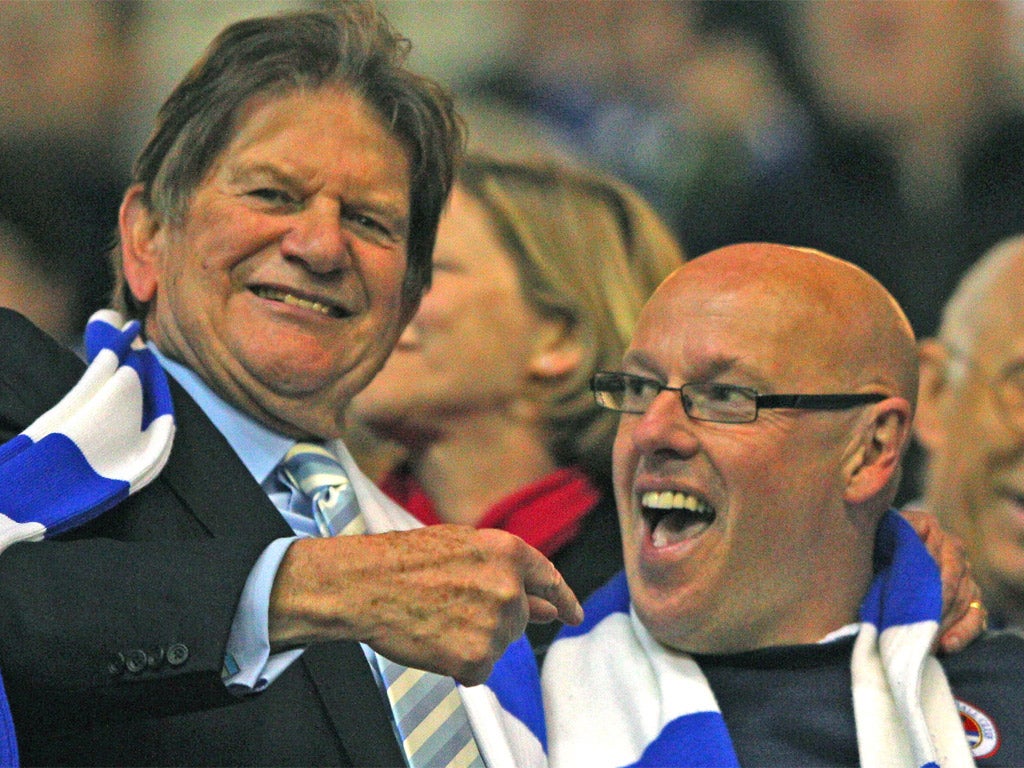 Sir John Madejski (left) and Brian McDermott celebrate promotion