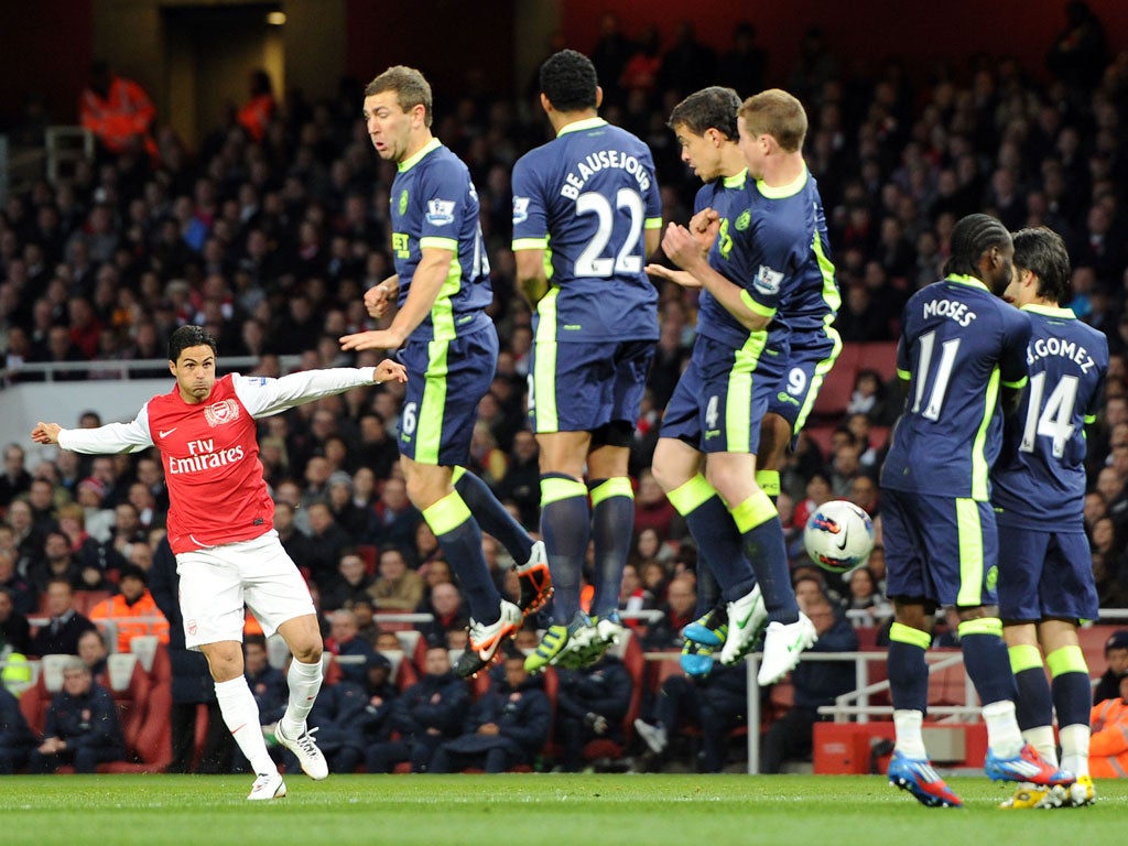 Arteta in action against Wigan