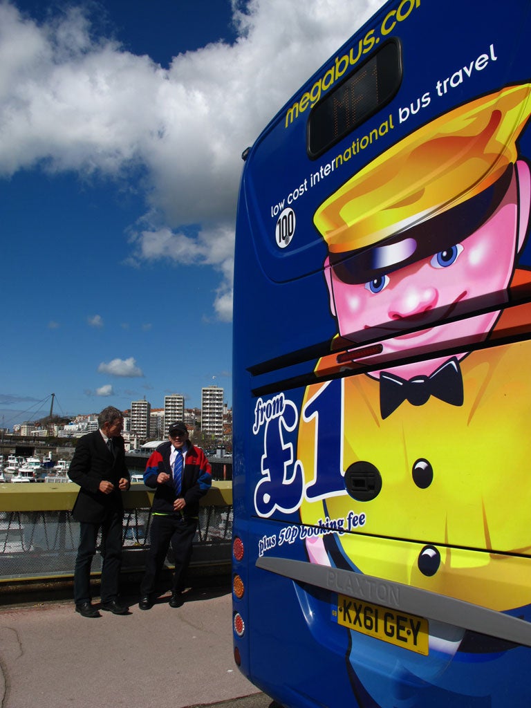 Busman's holiday: Simon Calder and Bob Auty in Boulogne