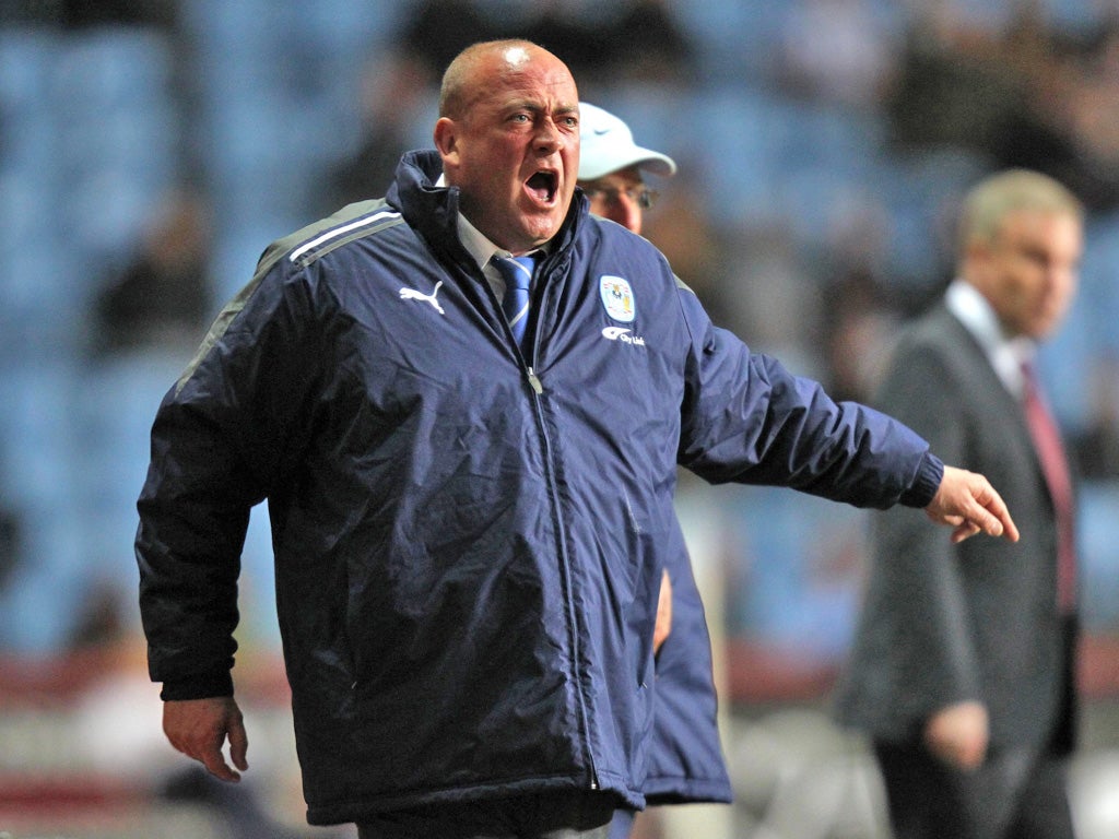 Andy Thorn (top) urges on Coventry against Millwall on Tuesday