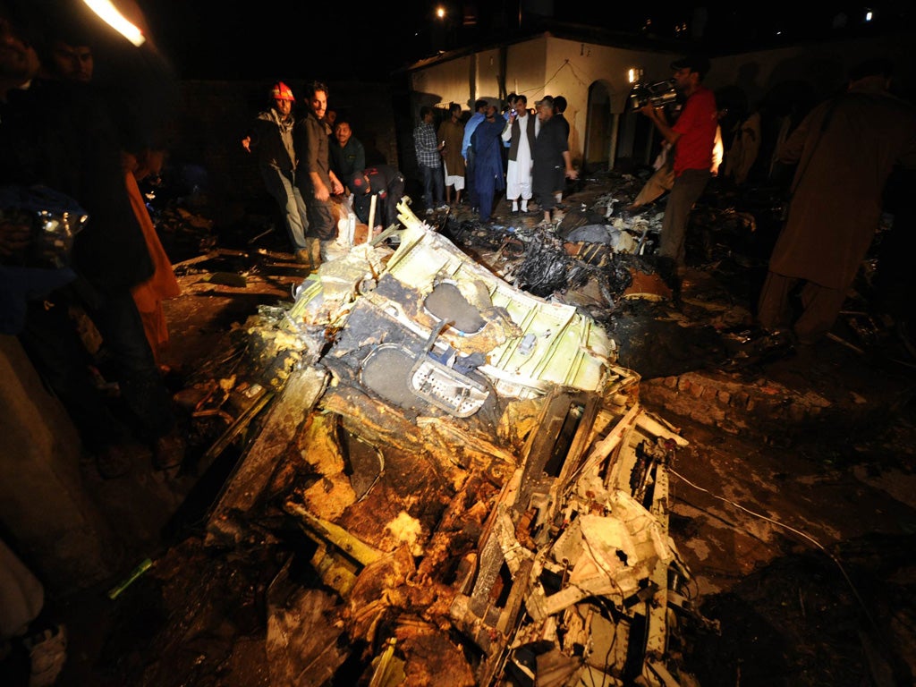 Officials at the site of the plane, which had flown from Karachi