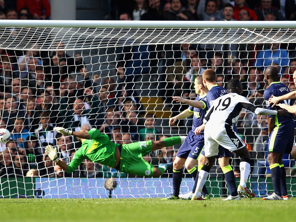 Out of reach: Philippe Senderos (far right) turns to celebrate after heading Fulham's winning goal beyond the diving Ali Al-Habsi from John Arne Riise's free-kick