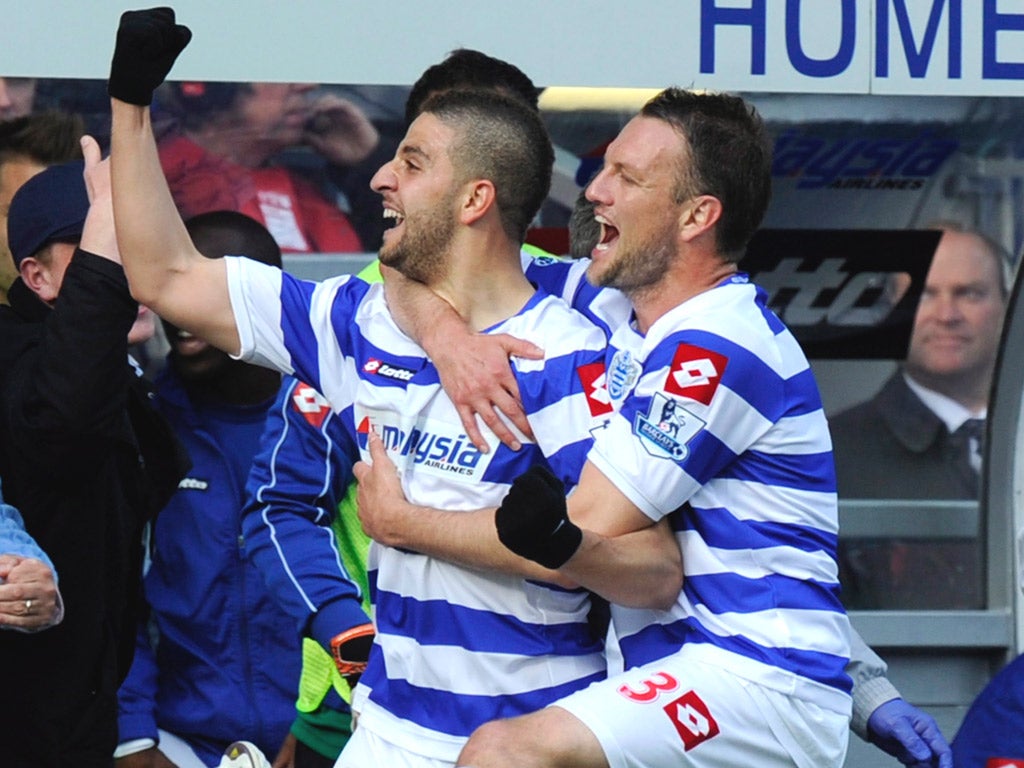 Adel Taarabt (left) celebrates scoring QPR’s winner against Tottenham