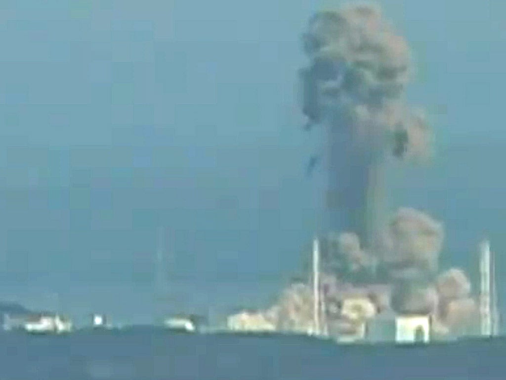 A hydrogen explosion rips through the tsunami-damaged Fukushima nuclear plant