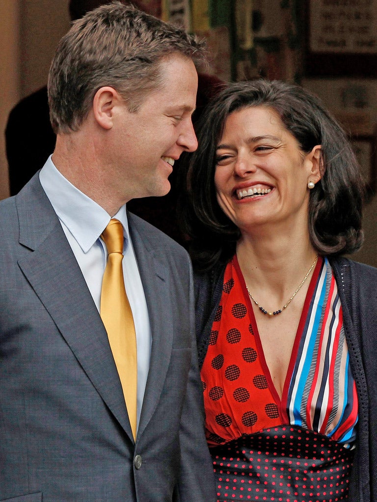 Britain's Liberal Democrat party leader Nick Clegg stands with his wife Miriam Gonzalez Durantez