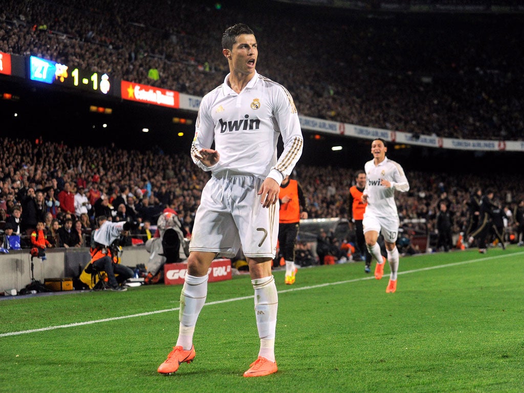 21 April 2012 Cristiano Ronaldo celebrates scoring Real Madrid's second goal as they recorded a prized victory over eternal rivals Barcelona. The Portuguese forward's goal, minutes after Alexis Sanchez's equaliser for the Catalans, proved to b