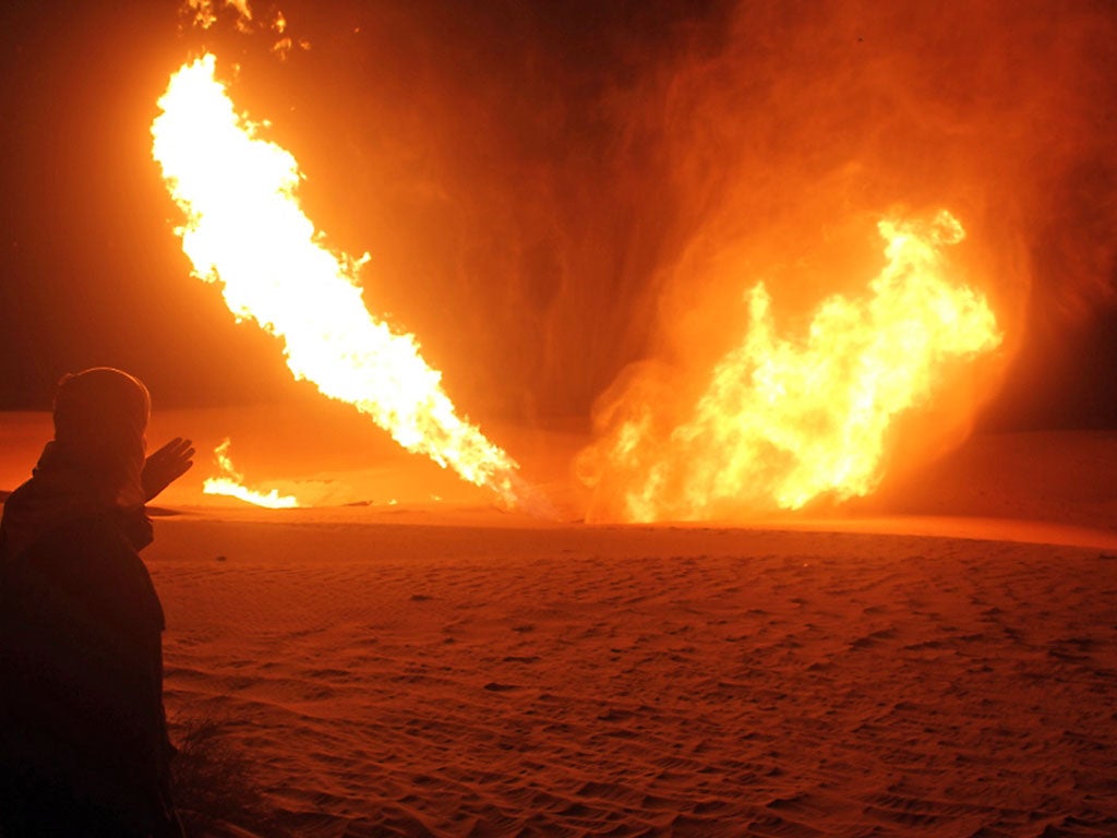 Flames rise from a pipeline in the Sinai peninsula that
delivers gas to Israel and Jordan. The supply line has
been attacked 14 times since January last year