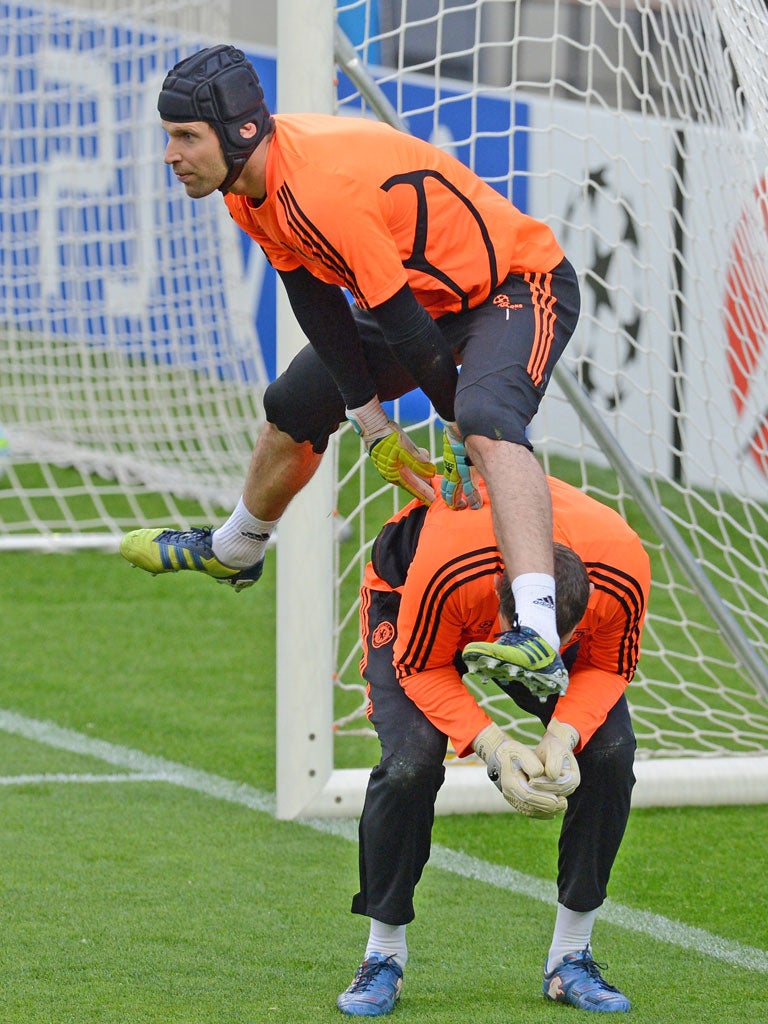 Petr Cech leapfrogs over team-mate Ross Turnbull