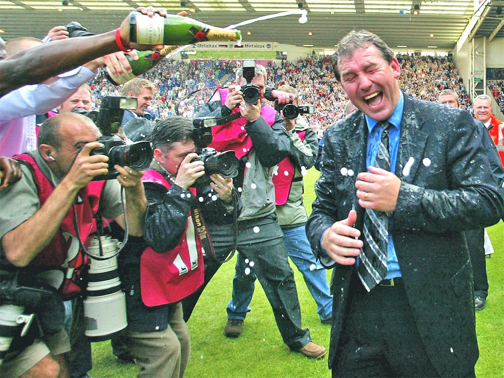 Bryan Robson is drenched as West Brom avoid the drop